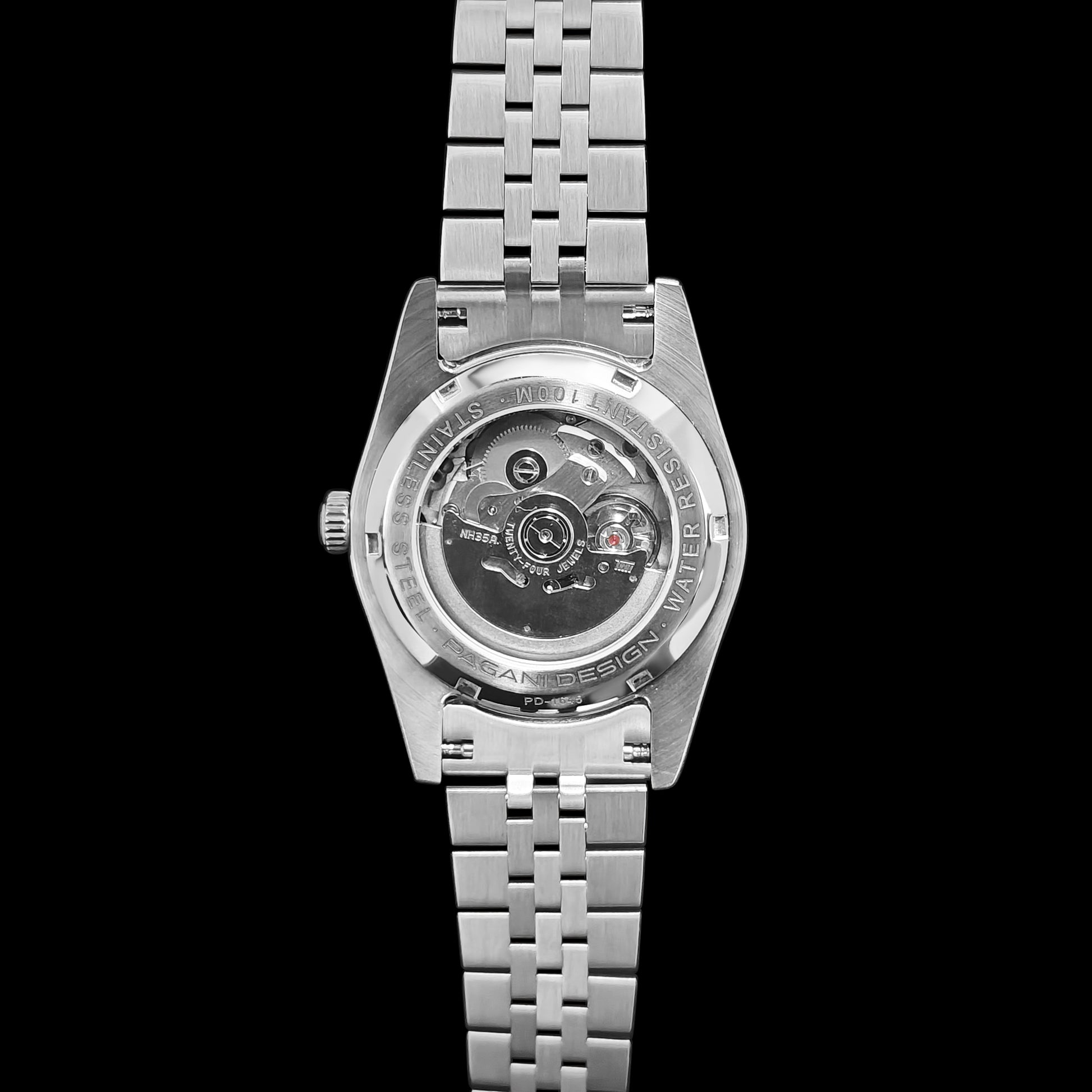 Back view of silver bracelet watch showing mechanical movement