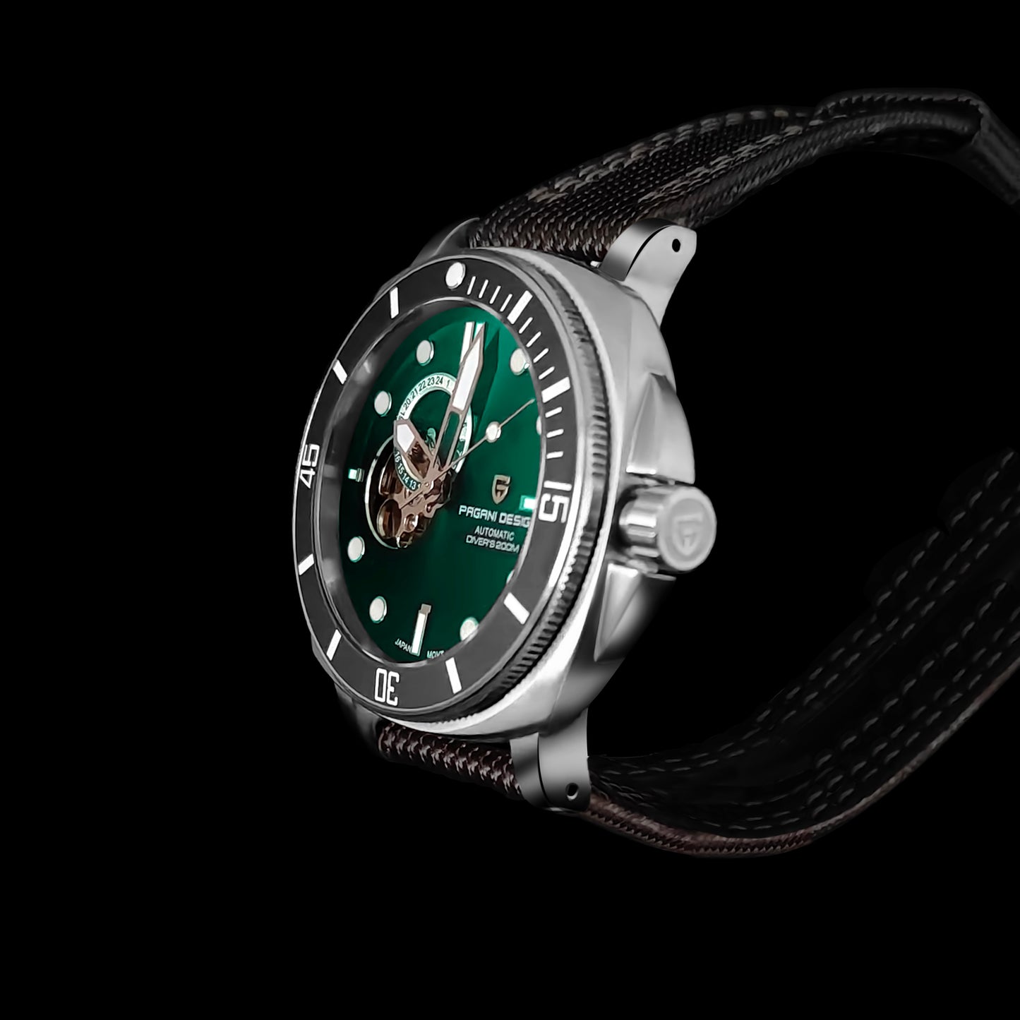 Side view of green dial wristwatch with fabric strap